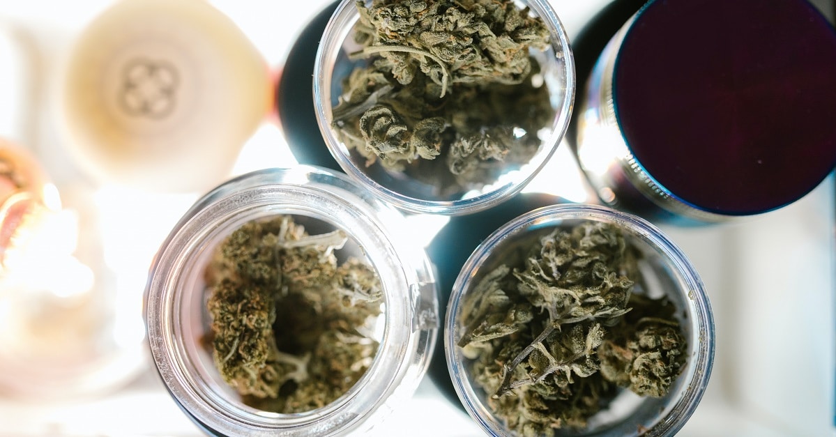 containers of marijuana buds at a dispensary