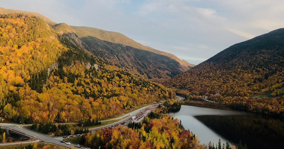 New Hampshire drivers with scenic backdrop