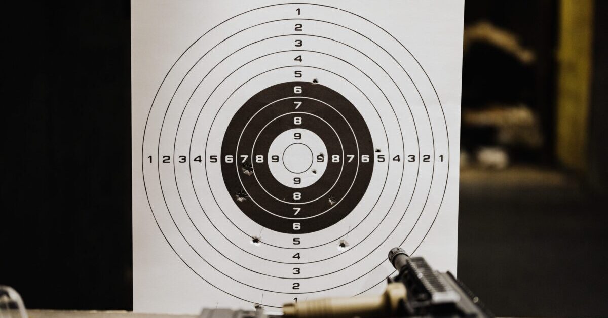shooting target sheet with bullet holes