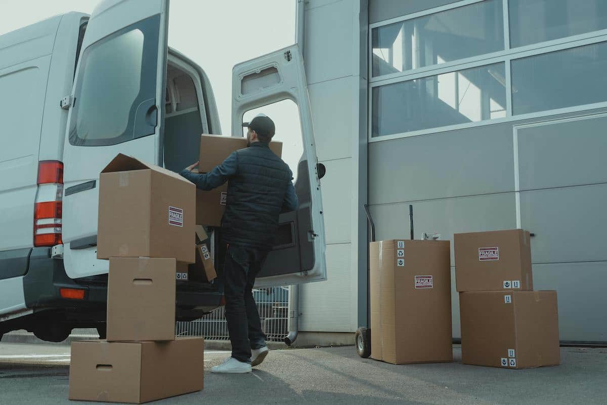 Verified driver loading cargo into a truck