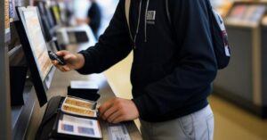 Person scanning ID for tobacco sales