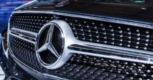 Mercedes logo on the front of a black car