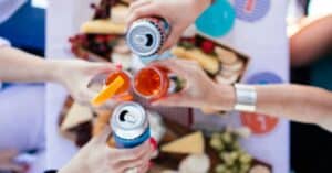 People enjoying canned cocktails