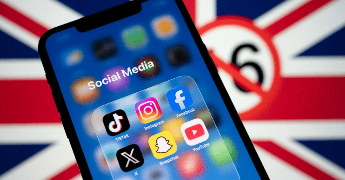 Social media apps and under 16 ban sign in front of UK flag