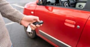 Person picking up rental car from rental car company